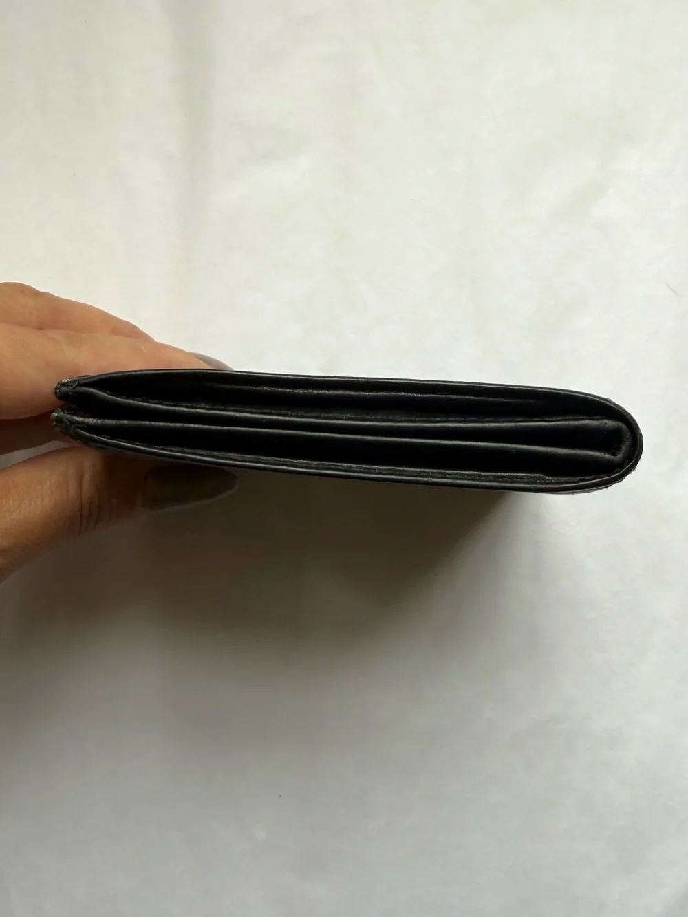 Vintage Coach Men’s Black Embossed Signature Leather Bifold Wallet